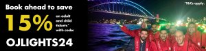 A group of passengers smiling against an illuminated harbour bridge background.. Text reads: Early-bird offer! Book a Vivid Sydney cruise before 30/04/24 and receive 15% off adult and child tickets with the promo code: OJLIGHTS24*